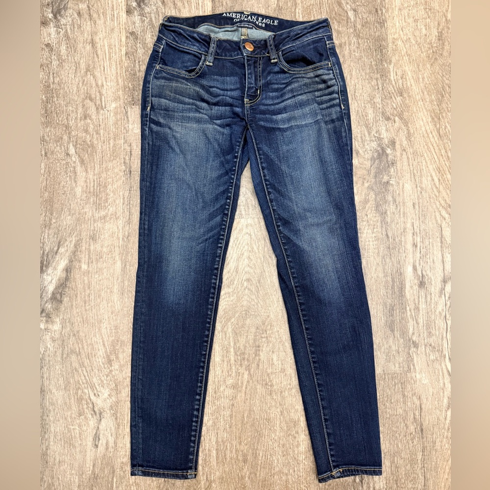 American Eagle Super Low Rise Jegging Sz 2 Short Dark Wash Whiskers Eagle patch